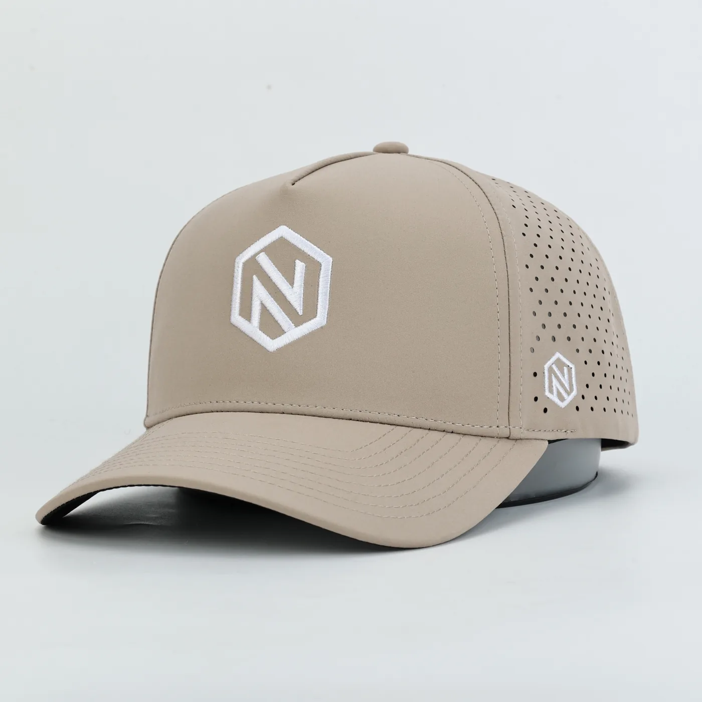 The NOGNS cap in Sand with the white embroidered hex N