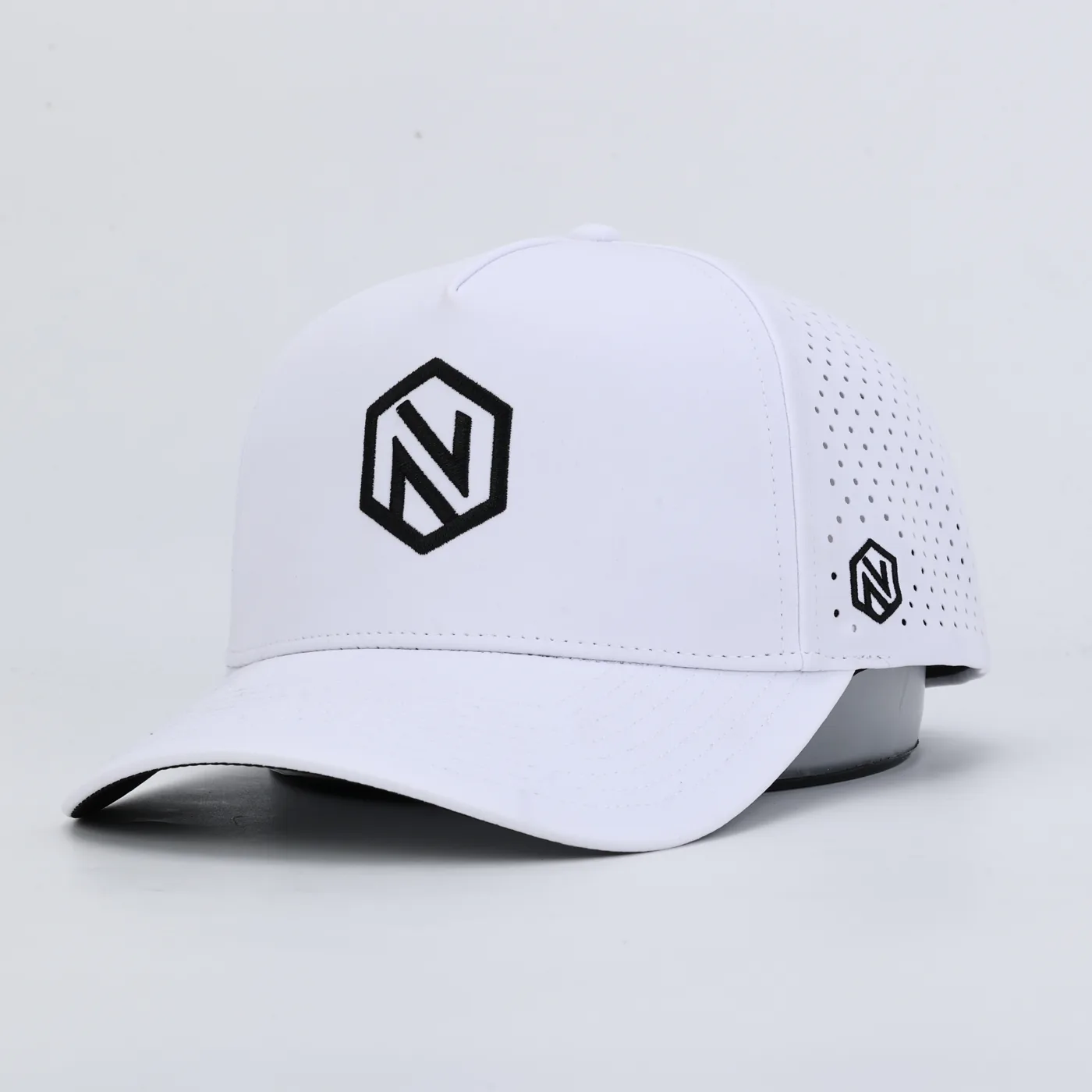 The white NOGNS cap with the black embroidered hex N